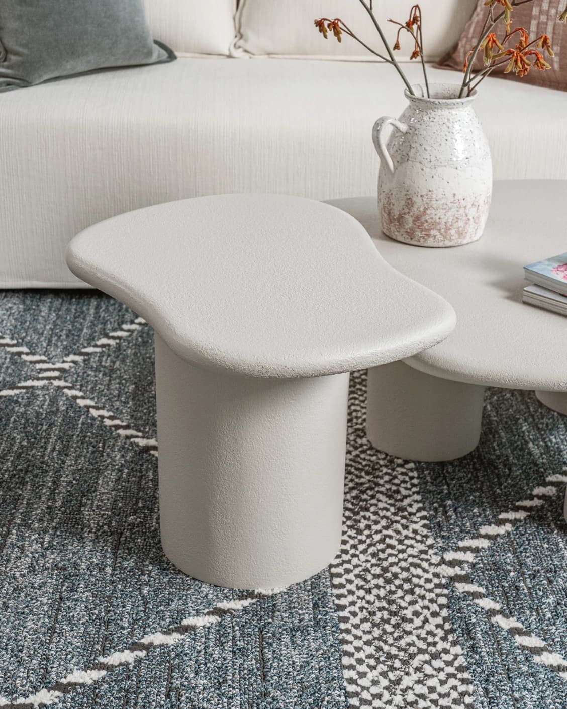 Verona side table in soft ivory and stone, shown in a lifestyle top view as image 2