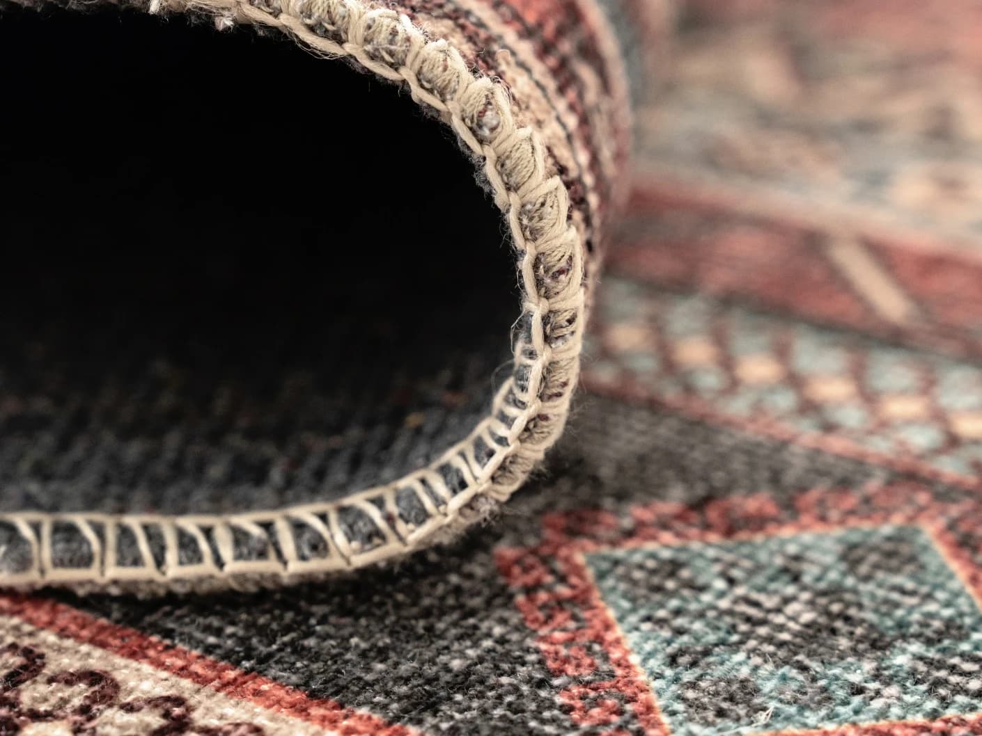 Vince Brick Runners carpets in red, shown in a product close-up view