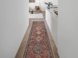 Vince Brick Runners carpet in red, shown in a lifestyle front view