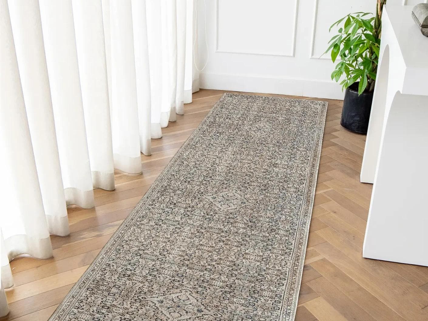 Vince Dune carpets in brown and beige, shown in a lifestyle front view as image 1