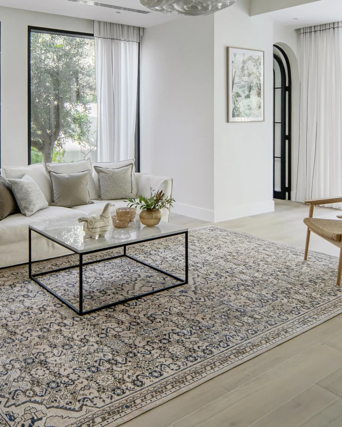 Vince Dune carpet in brown and beige, shown in a lifestyle left view as image 7