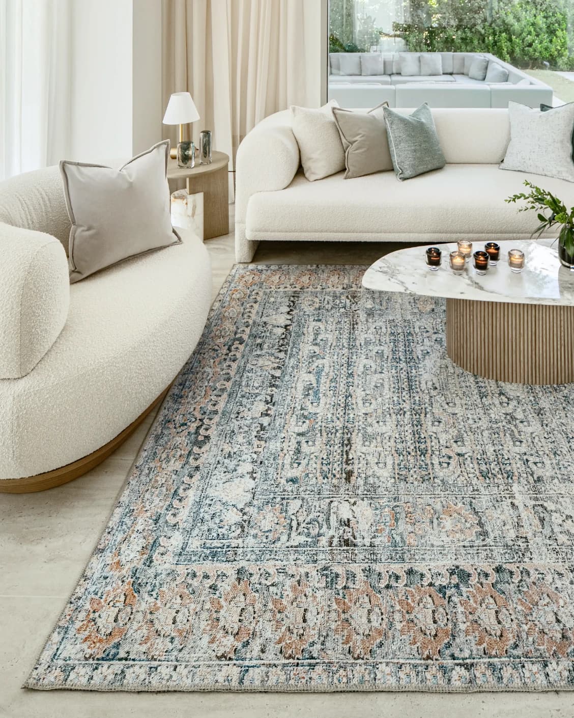 Vince Lake carpet in blue and rust, shown in a lifestyle front view as image 5