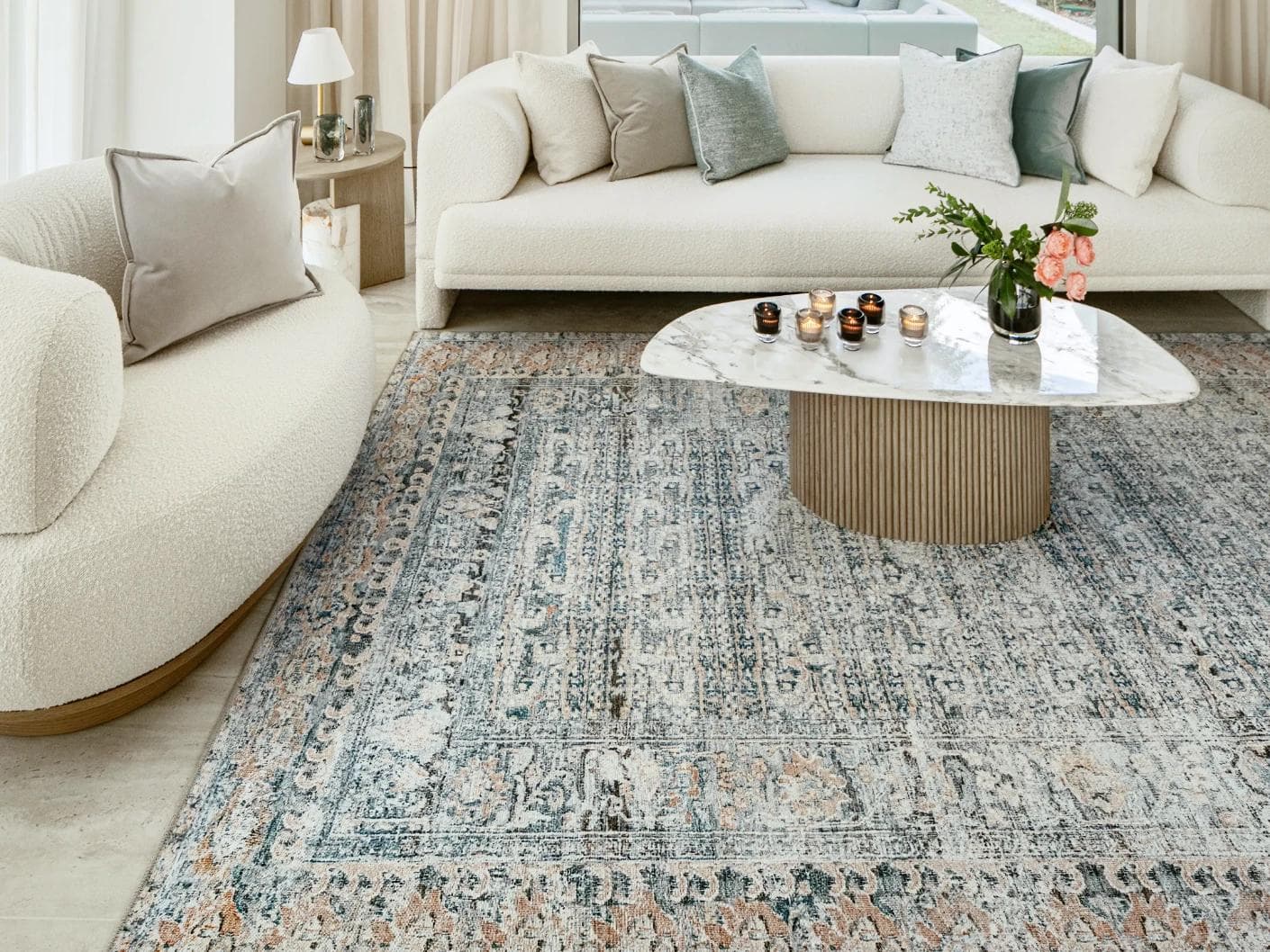 Vince Lake carpet in blue and rust, shown in a lifestyle front view as image 5