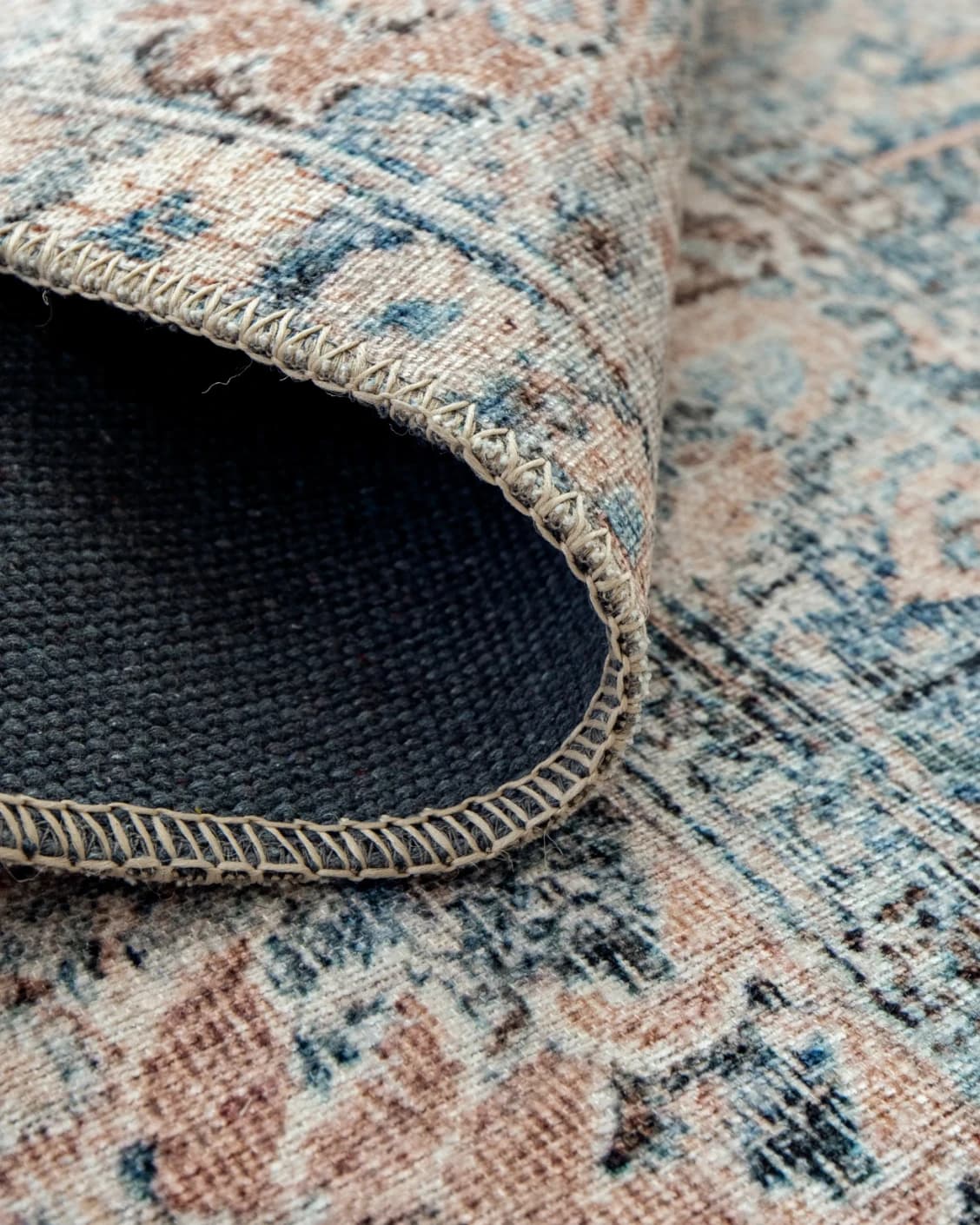 Vince Lake carpet in blue and rust, shown in a product close-up as image 11