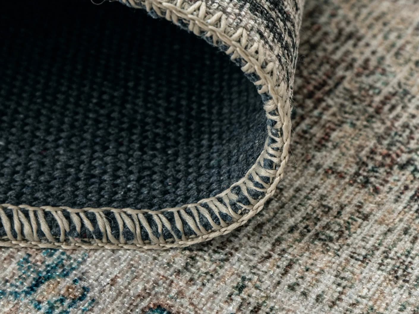 Vince Mira carpet in grey, shown in a lifestyle front view as image 5