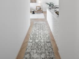 Vince Porcini Runners carpet in grey and charcoal, shown in a lifestyle front view