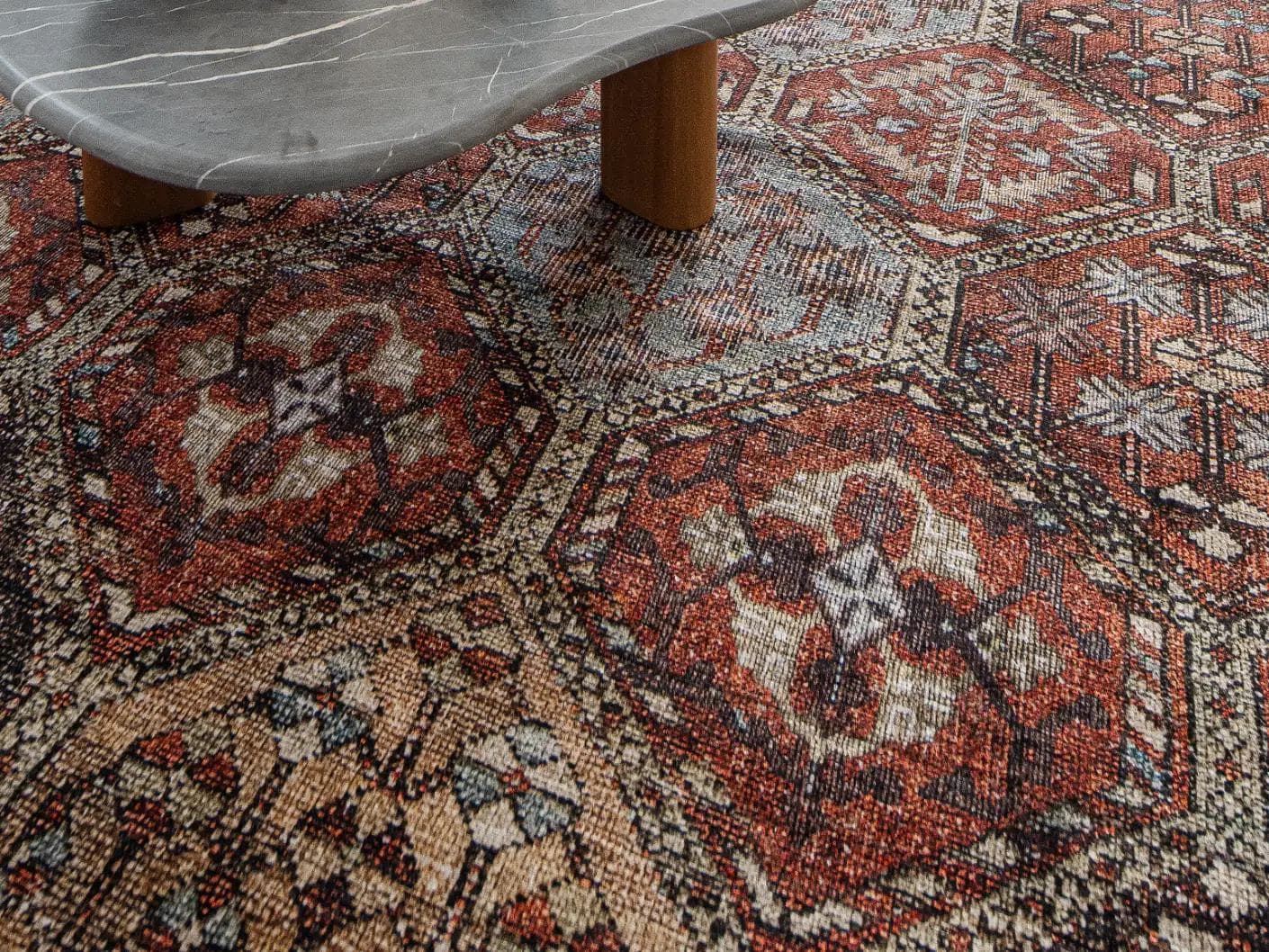 Vince Rosso carpet in rust and multicolour, shown in a lifestyle close-up as image 4