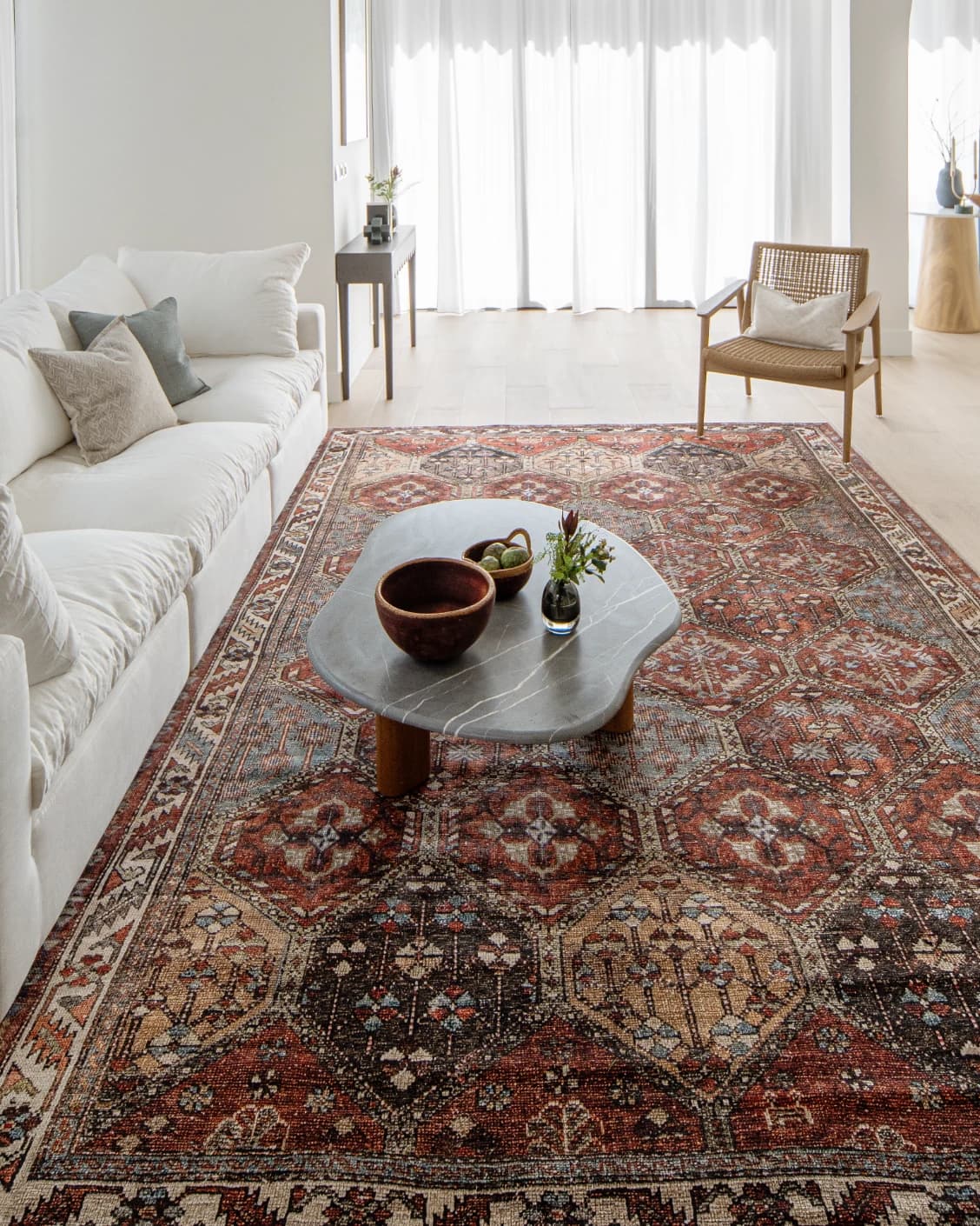 Vince Rosso carpet in rust and multicolour, shown in a lifestyle front view as image 5