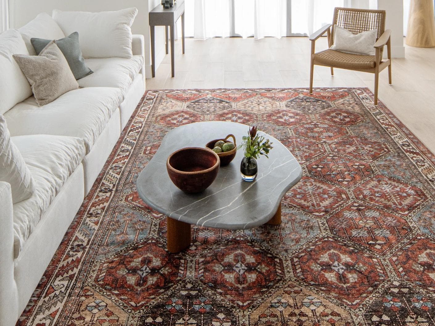 Vince Rosso carpet in rust and multicolour, shown in a lifestyle front view as image 5
