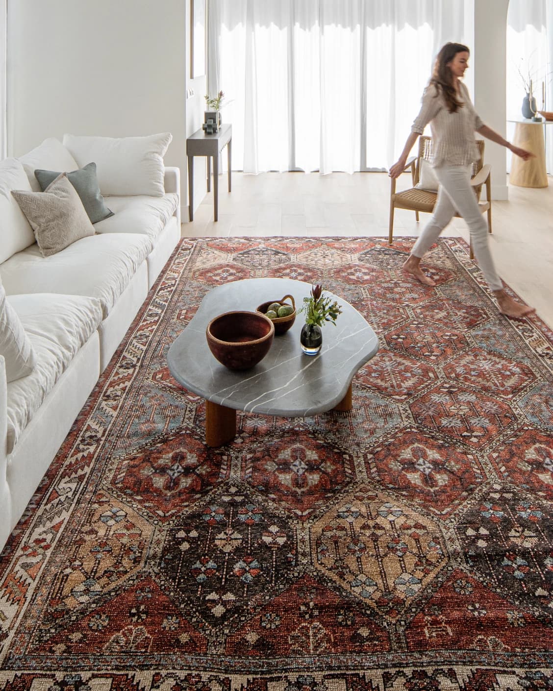Vince Rosso carpet in rust and multicolour, shown in a lifestyle front view as image 6