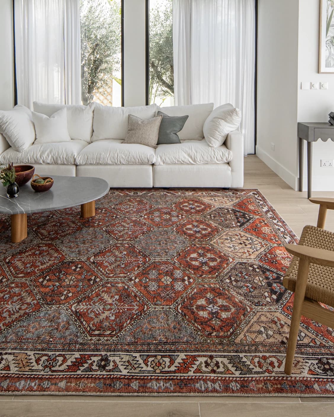 Vince Rosso carpet in rust and multicolour, shown in a lifestyle front view as image 8
