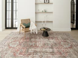 Vince Rouge carpet in red and multicolour, shown in a lifestyle front view