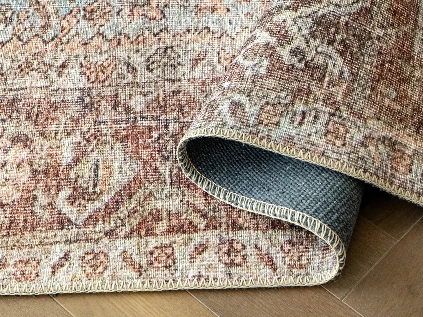 Vince Sandy carpets in sandy, beige and multicolour, shown in a product close-up view