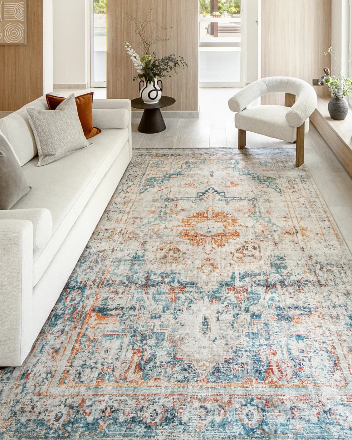 Vince Tangelo carpet in beige, blue, orange and multicolour, shown in a lifestyle front view as image 4