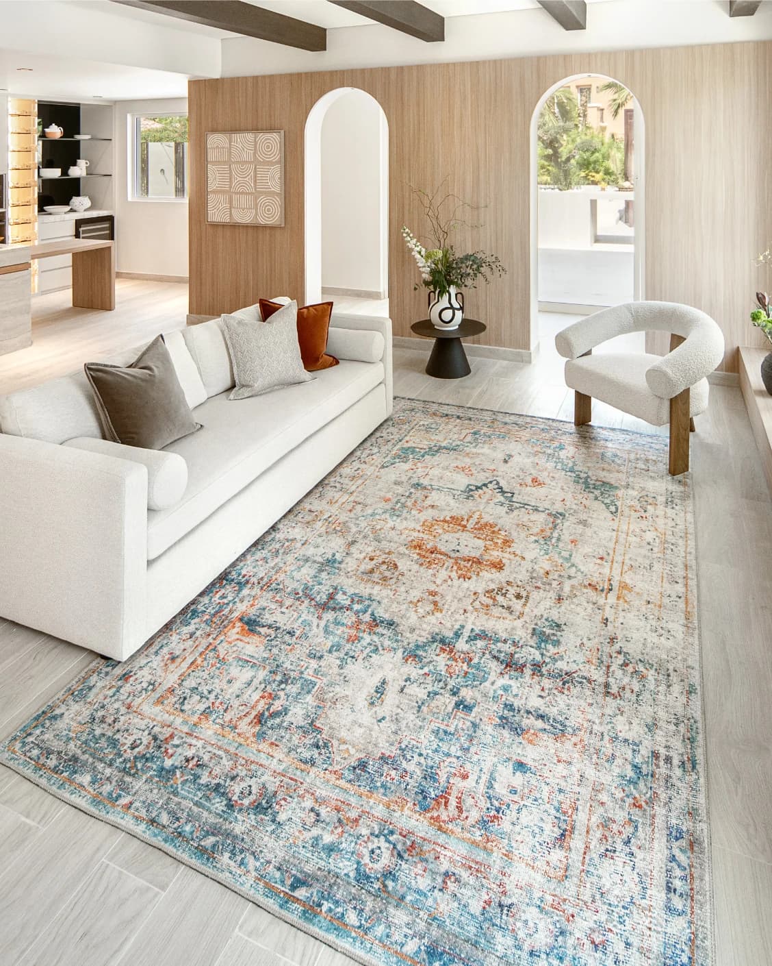 Vince Tangelo carpet in beige, blue, orange and multicolour, shown in a lifestyle right view as image 7