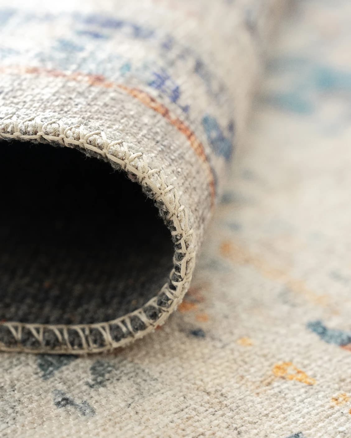 Vince Tangelo carpet in beige, blue, orange and multicolour, shown in a product close-up as image 11
