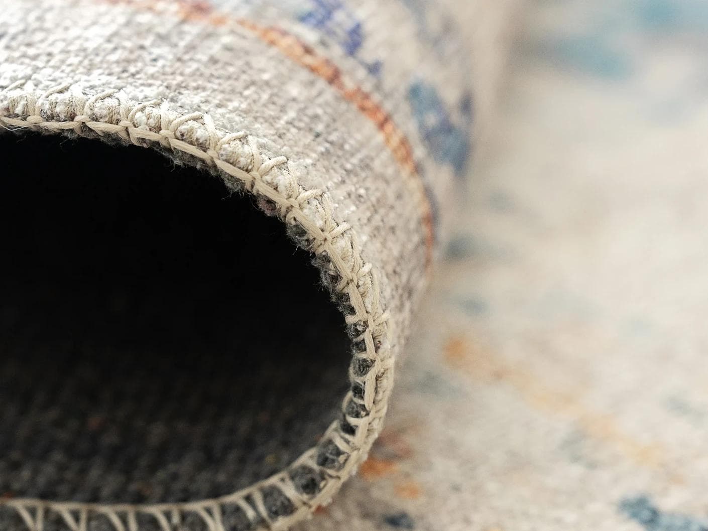 Vince Tangelo carpet in beige, blue, orange and multicolour, shown in a product close-up as image 11