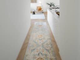 Vince Tangelo Runners carpet in beige, blue, orange and multicolour, shown in a lifestyle front view