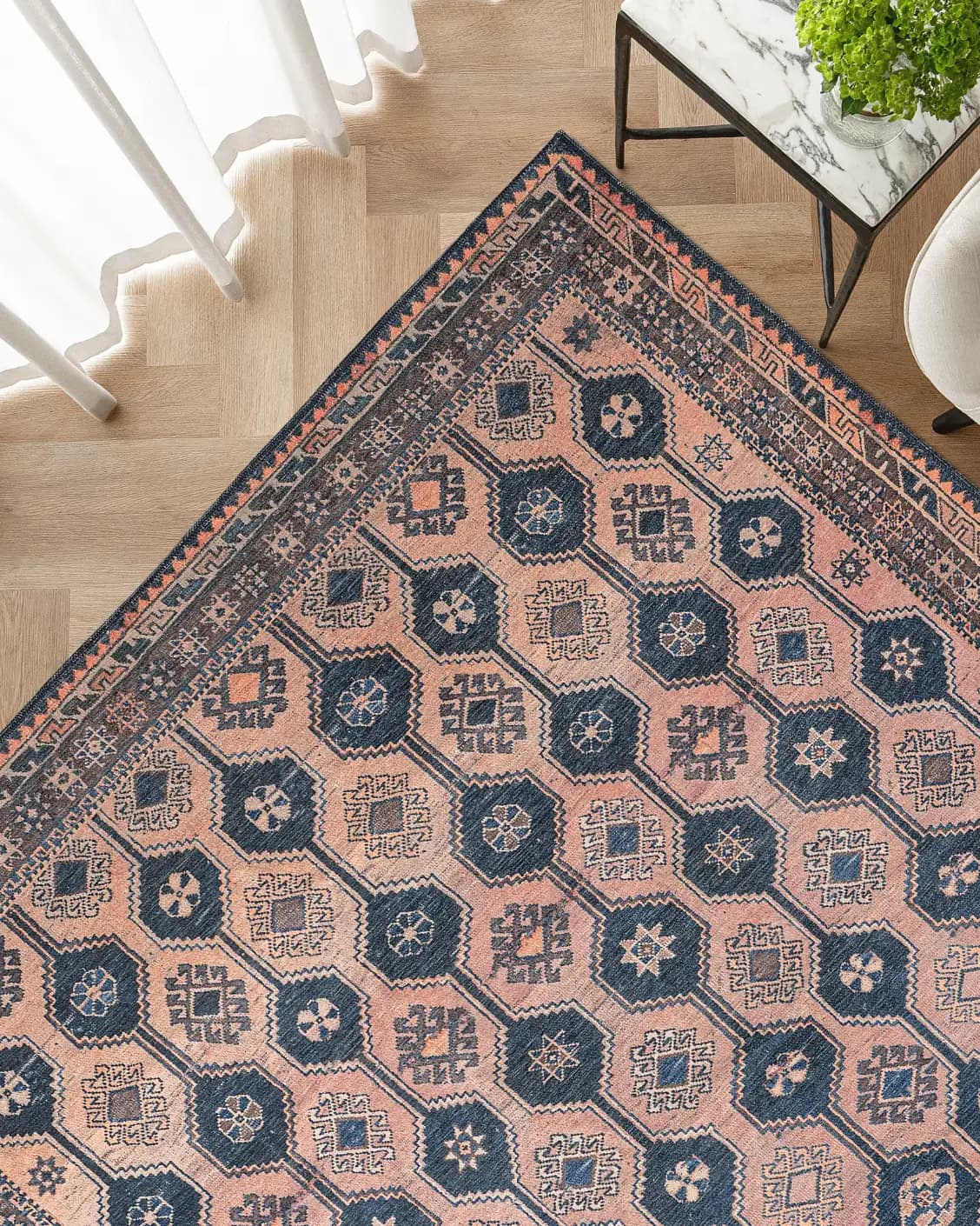 Vincent Blossom carpet in pink, blue and multicolour, shown in a lifestyle top view as image 2
