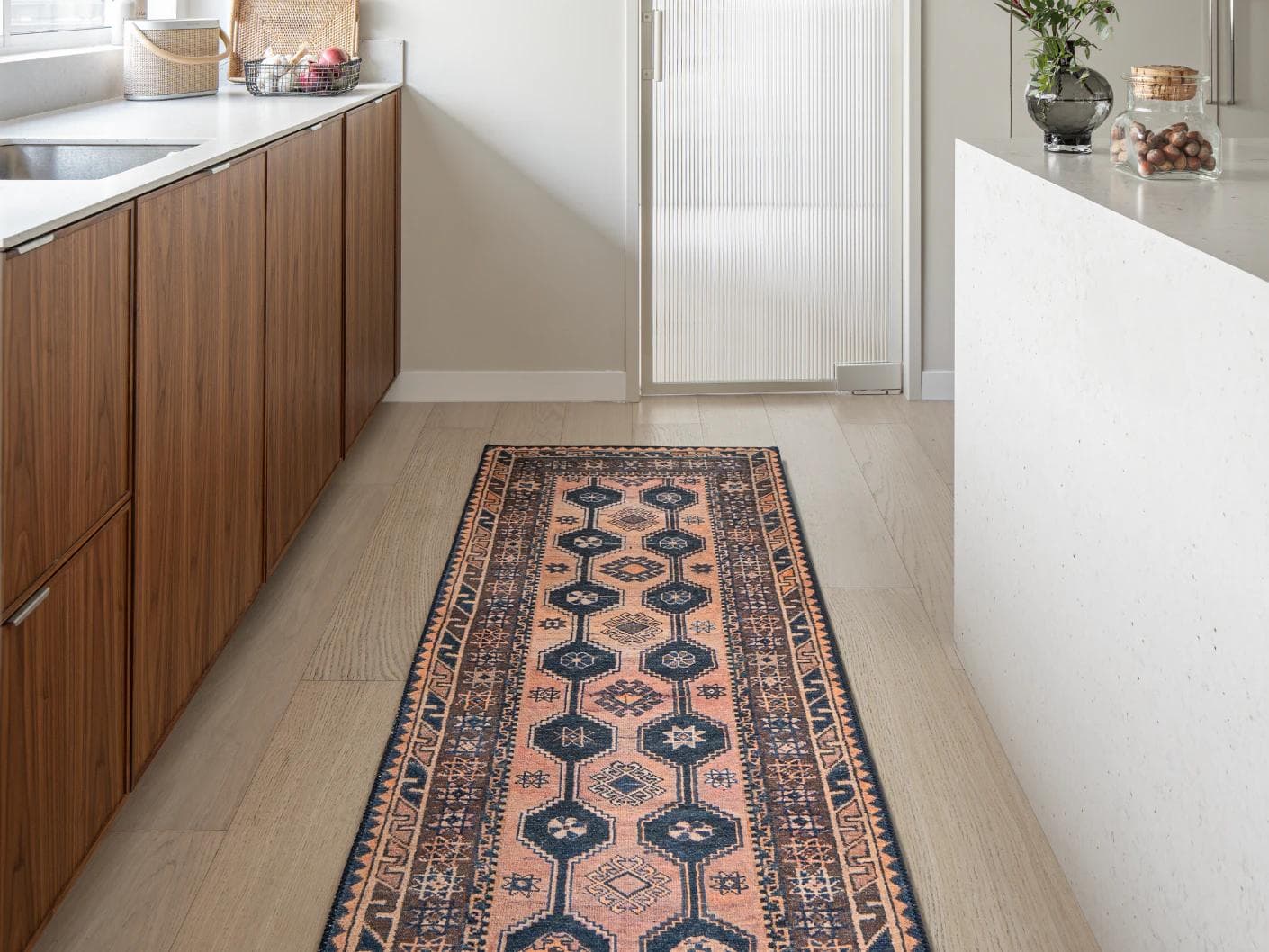 Vincent Blossom carpets in pink, blue and multicolour, shown in a lifestyle front view as image 1