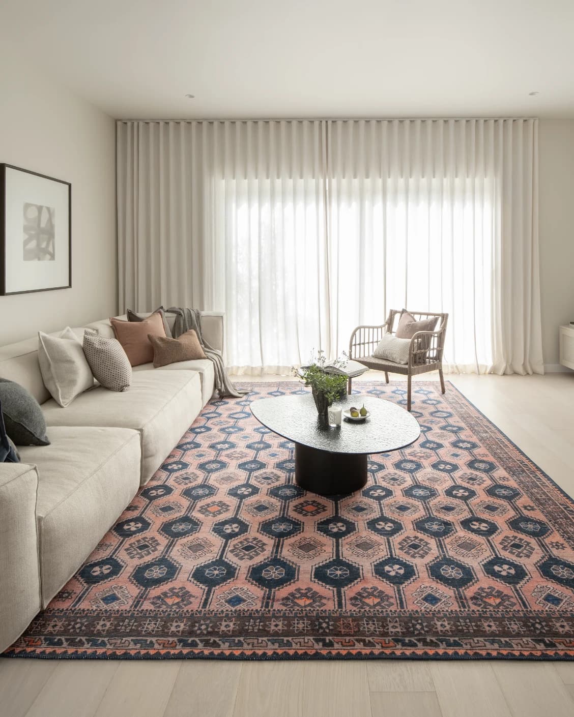 Vincent Blossom carpet in pink, blue and multicolour, shown in a lifestyle front view as image 11