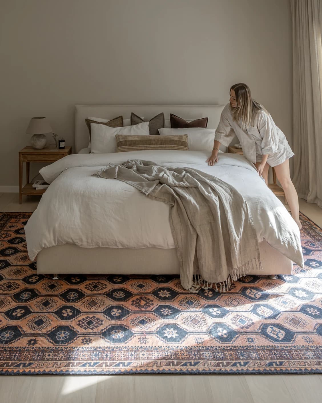 Vincent Blossom carpet in pink, blue and multicolour, shown in a lifestyle front view as image 19
