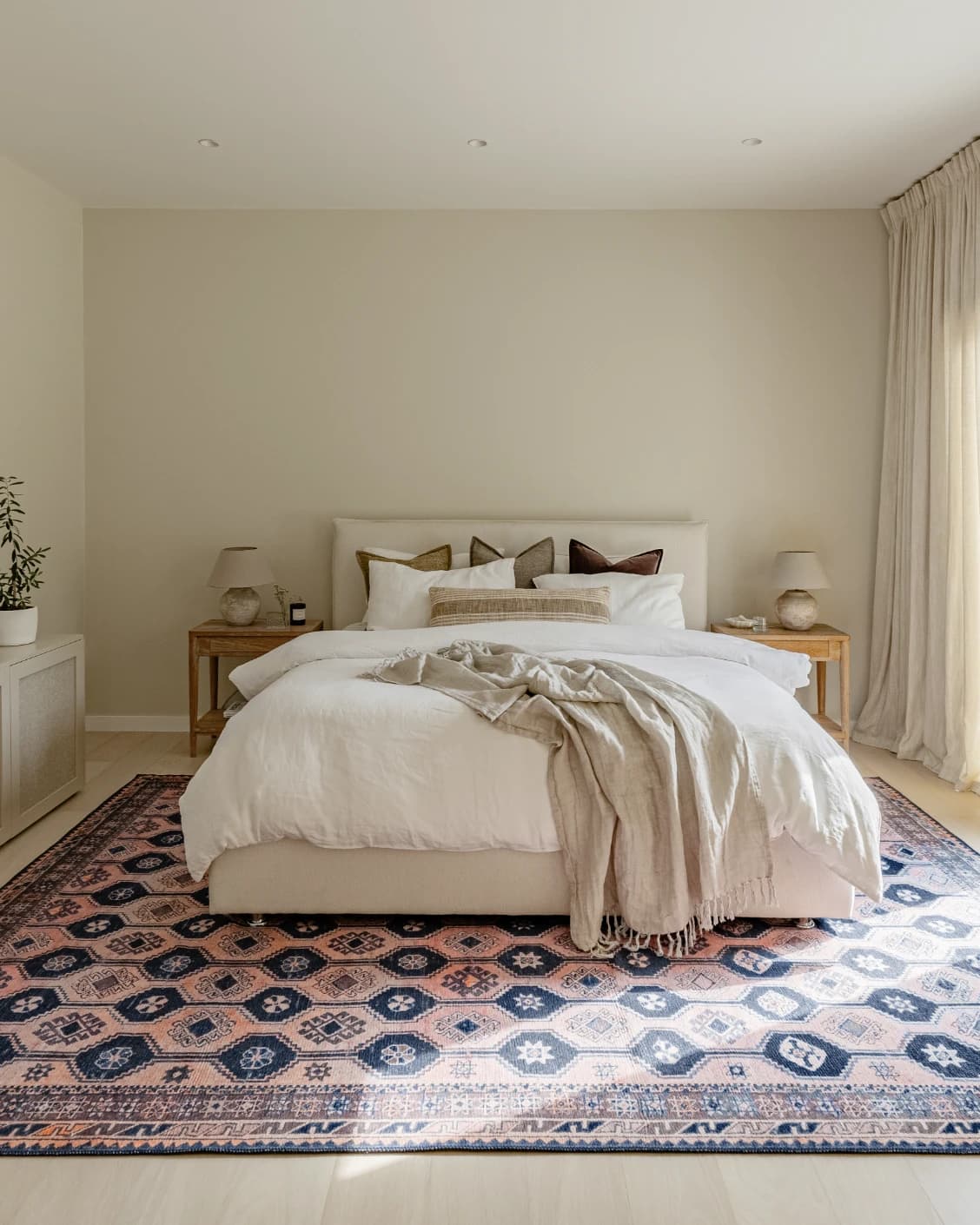 Vincent Blossom carpet in pink, blue and multicolour, shown in a lifestyle front view as image 17