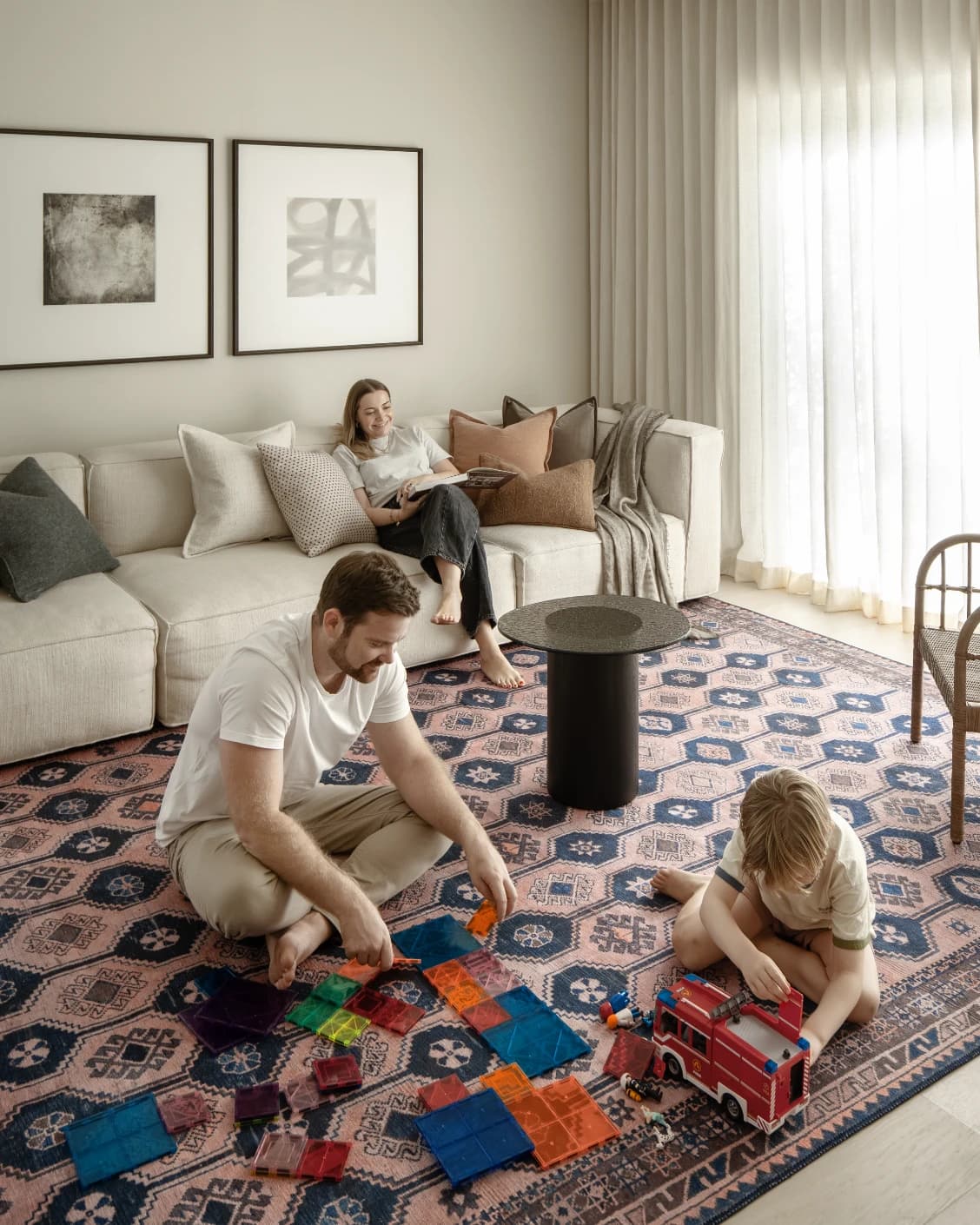 Vincent Blossom carpet in pink, blue and multicolour, shown in a lifestyle front view as image 13
