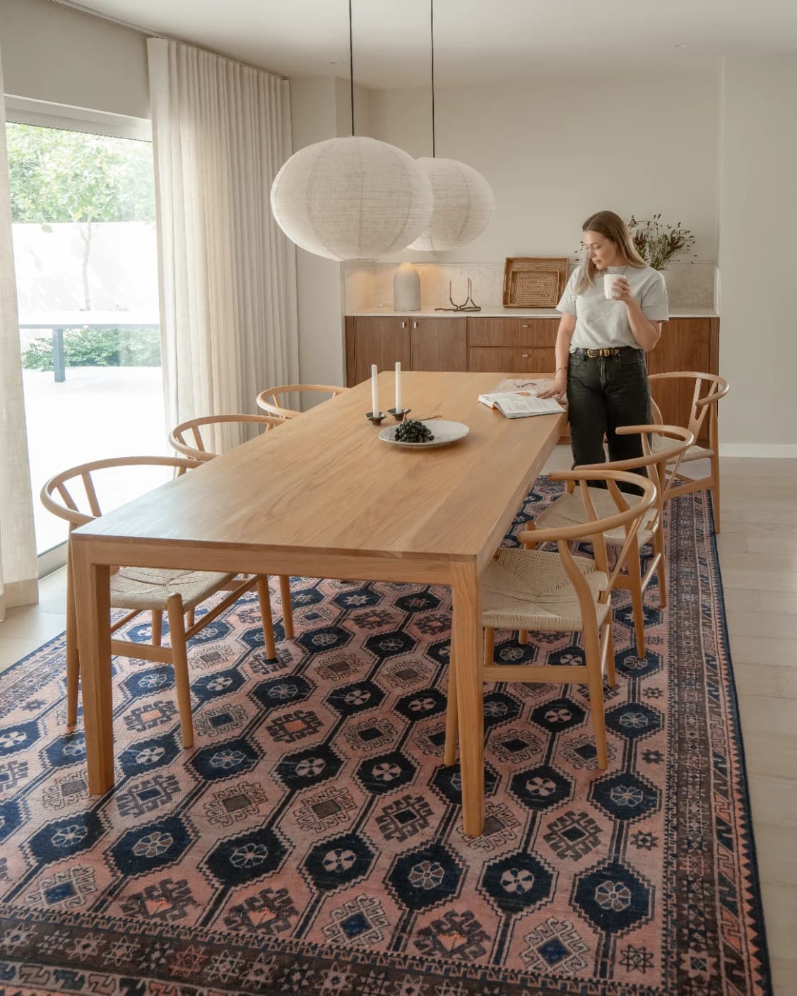 Vincent Blossom carpet in pink, blue and multicolour, shown in a lifestyle front view as image 7