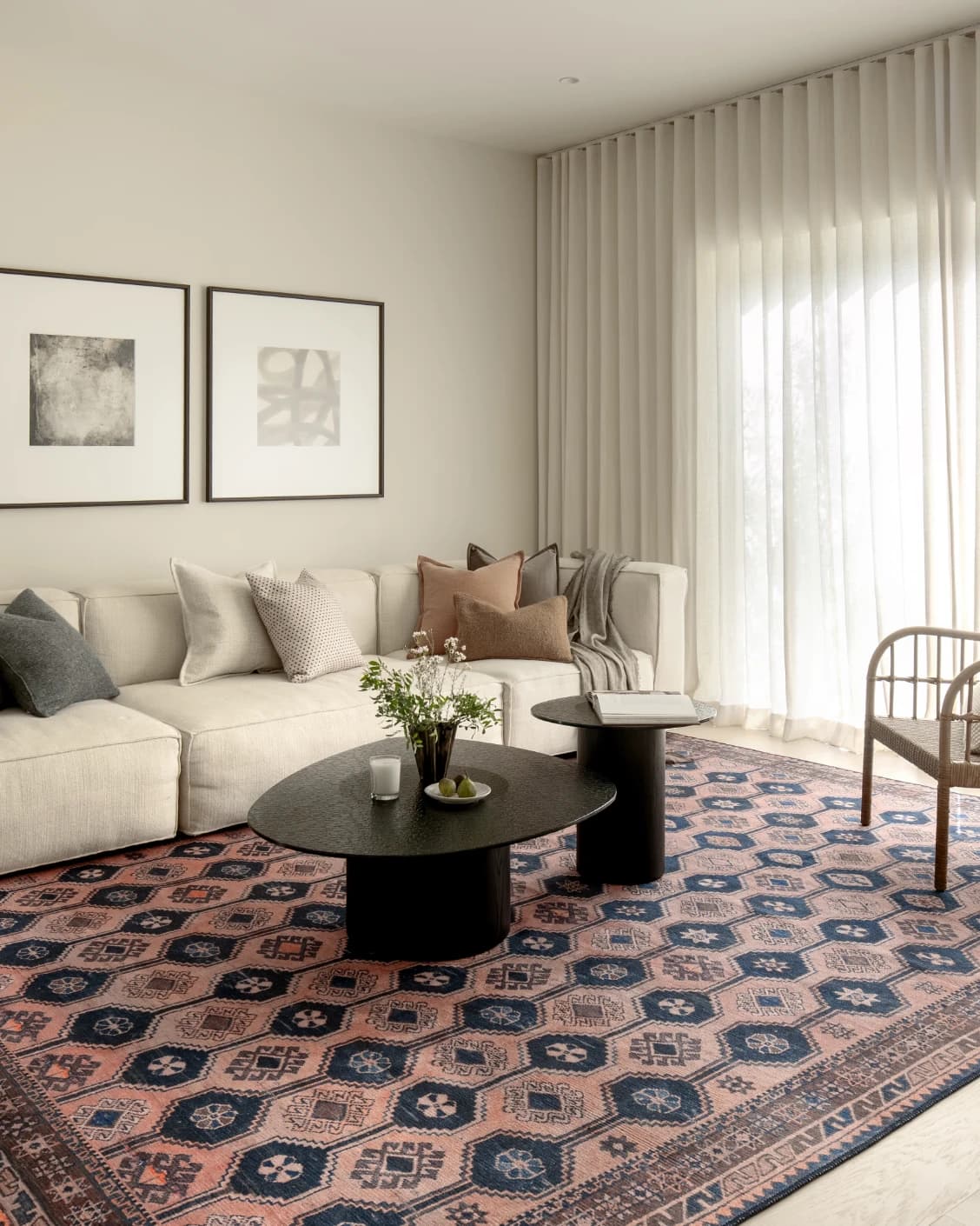 Vincent Blossom carpet in pink, blue and multicolour, shown in a lifestyle left view as image 21