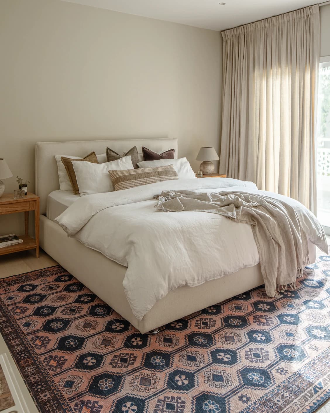 Vincent Blossom carpet in pink, blue and multicolour, shown in a lifestyle left view as image 23