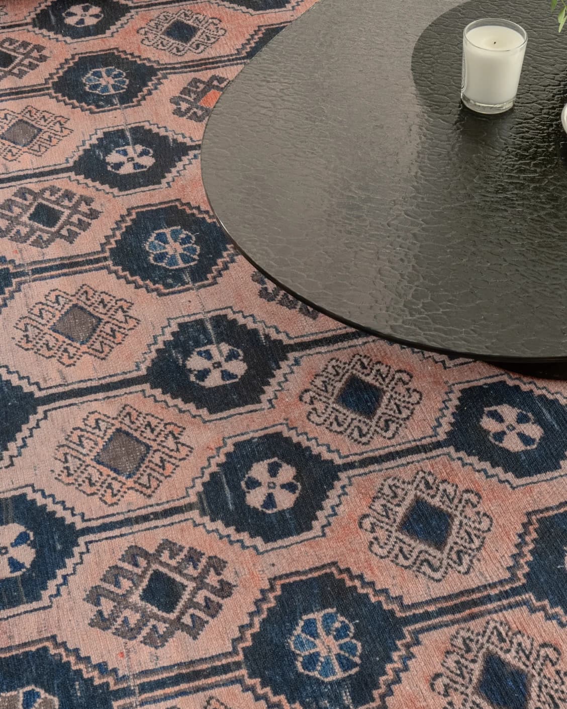 Vincent Blossom carpet in pink, blue and multicolour, shown in a lifestyle top view as video image