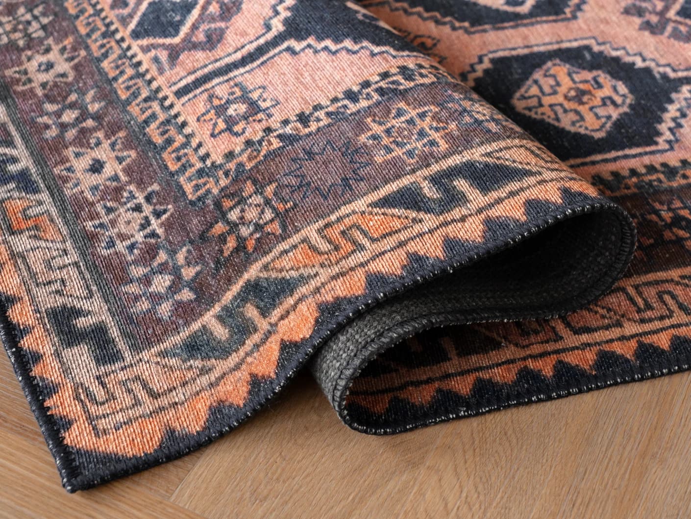 Vincent Blossom Runners carpets in pink, blue and multicolour, shown in a product close-up view