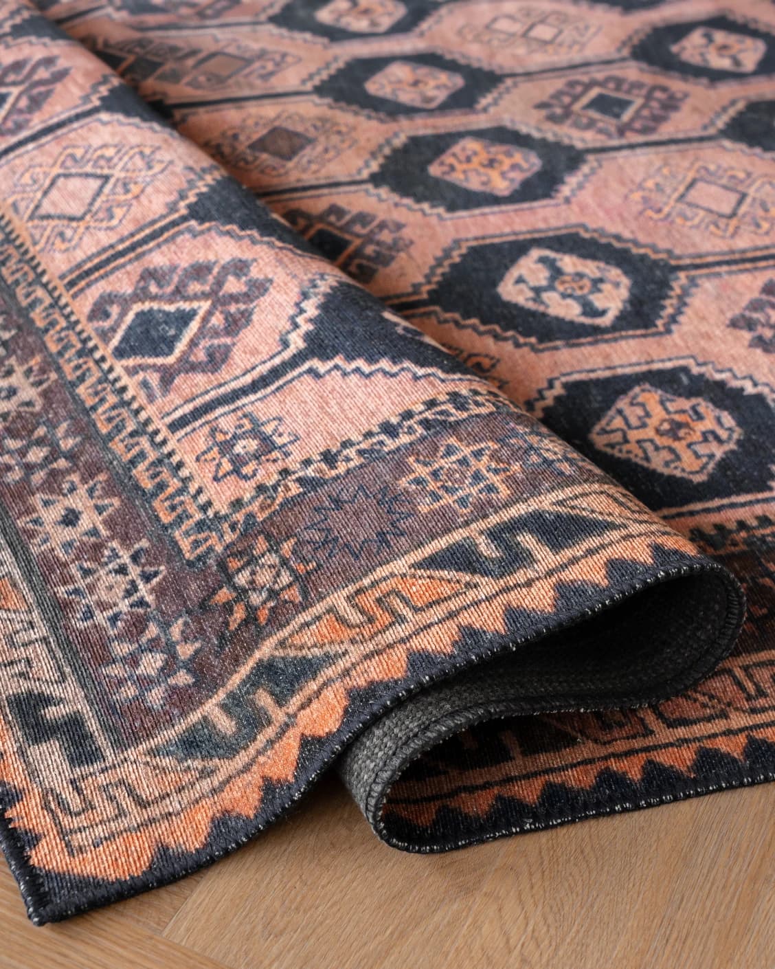 Vincent Blossom carpet in pink, blue and multicolour, shown in a product close-up as image 27
