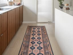 Vincent Blossom Runners carpet in pink, blue and multicolour, shown in a lifestyle front view
