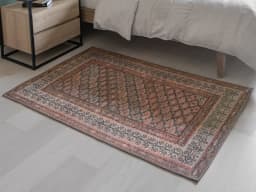 Vincent Copper carpet in taupe, orange and multicolour, shown in a lifestyle front view