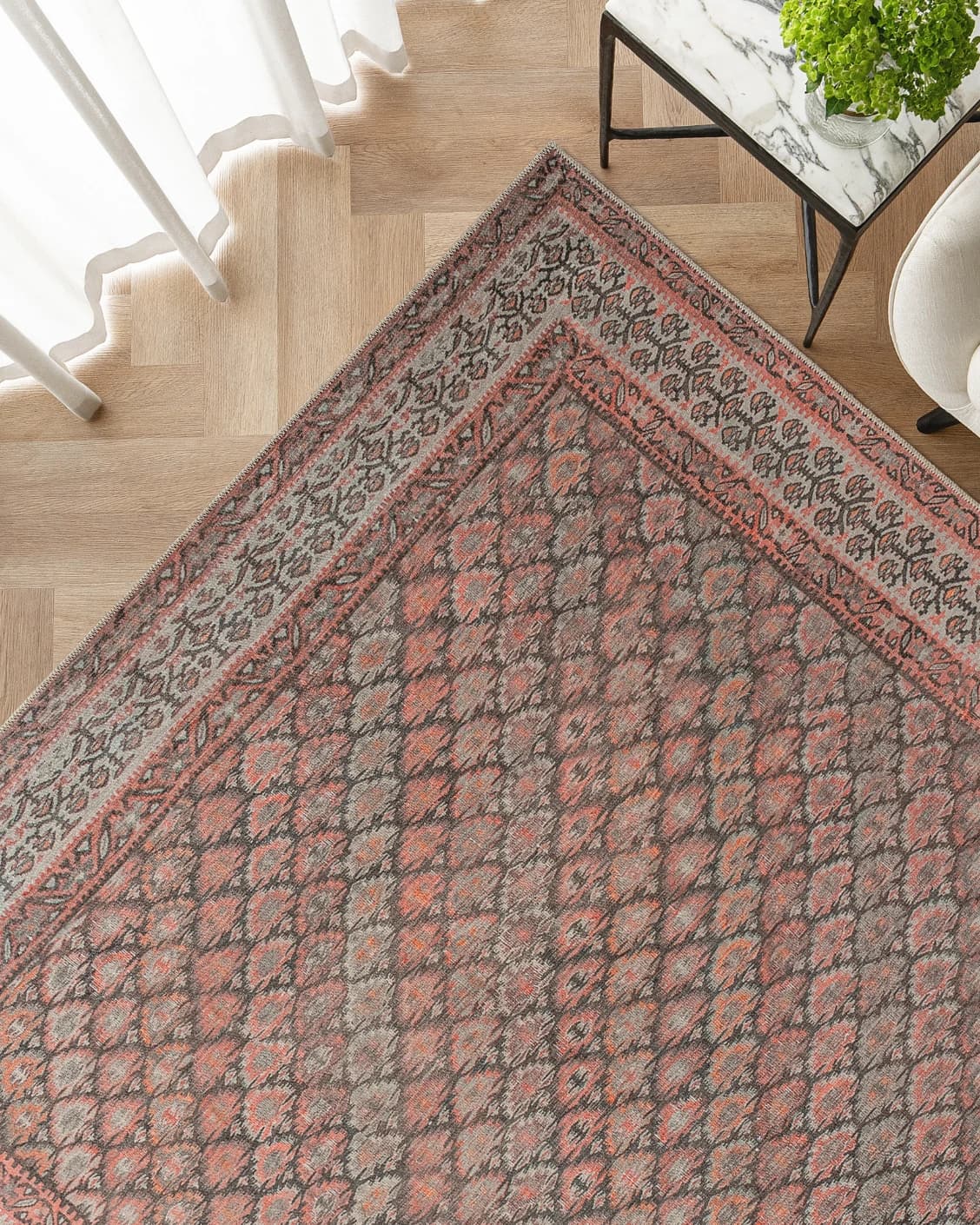 Vincent Copper carpet in taupe, orange and multicolour, shown in a lifestyle top view as image 2