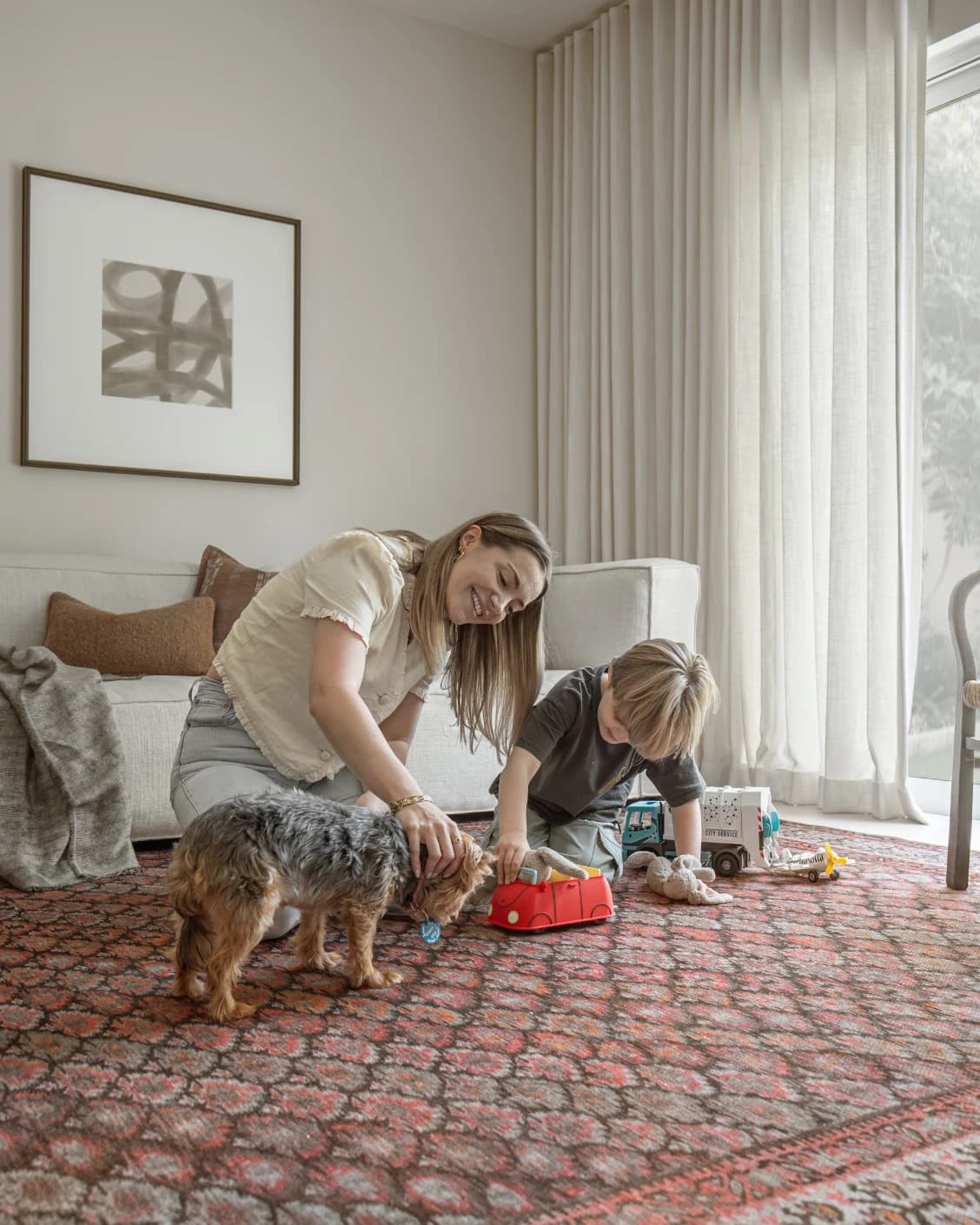 Vincent Copper carpet in taupe, orange and multicolour, shown in a lifestyle left view as image 18