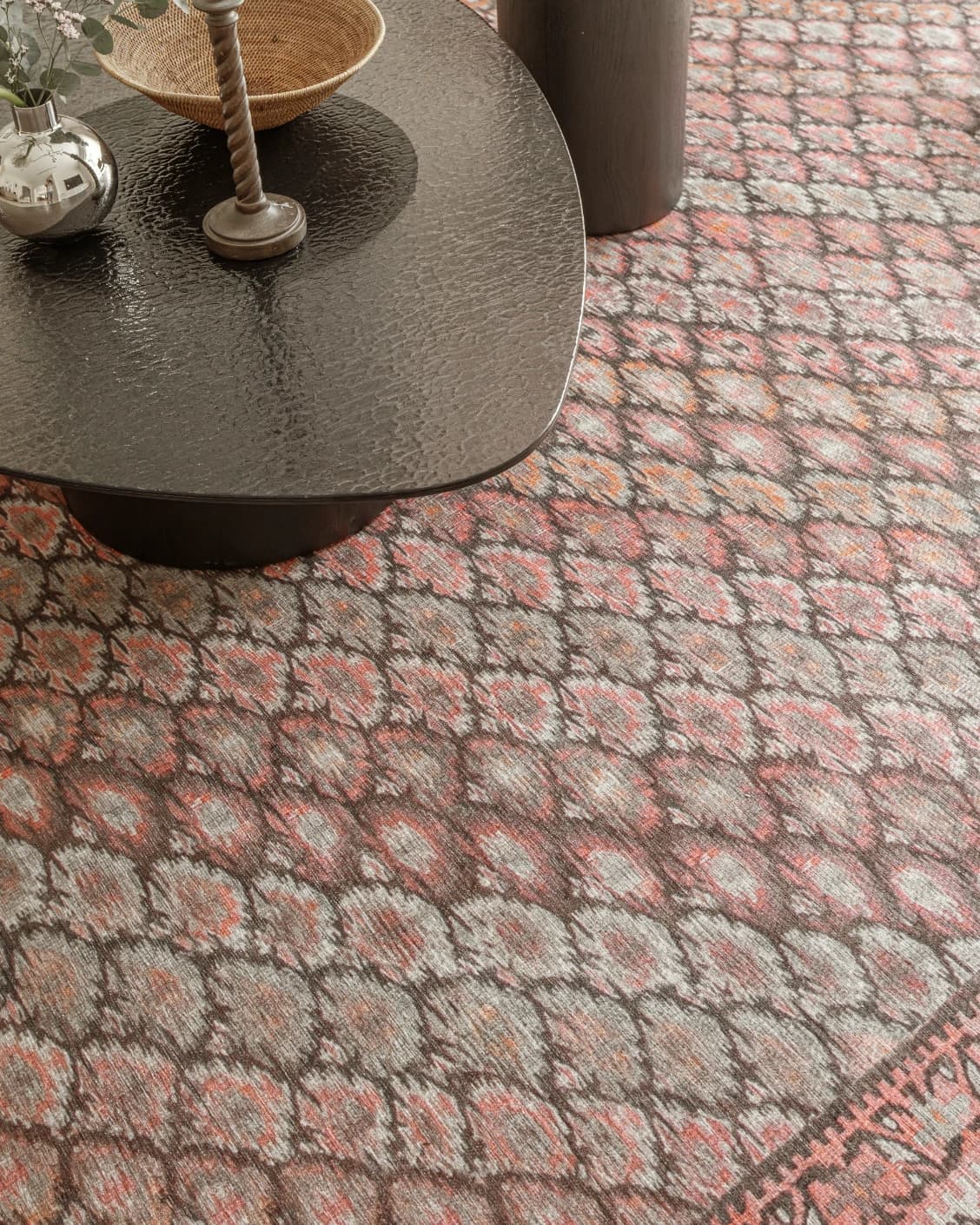 Vincent Copper carpet in taupe, orange and multicolour, shown in a lifestyle top view as video image