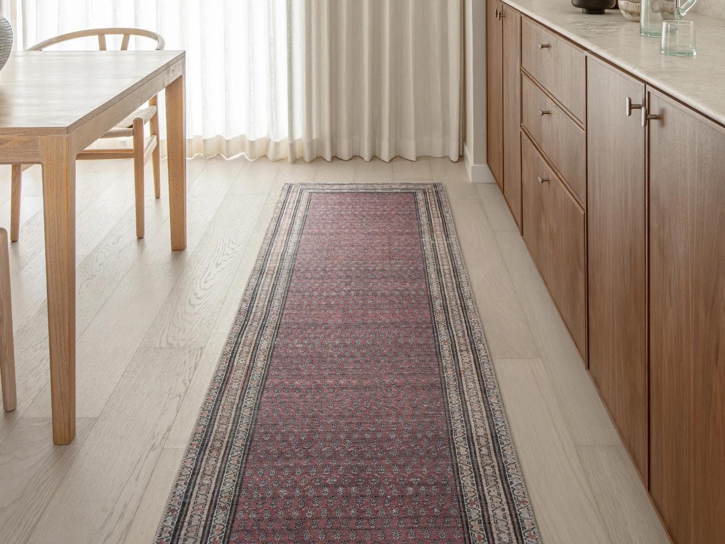 Vincent Coral carpets in red and multicolour, shown in a lifestyle front view as image 1