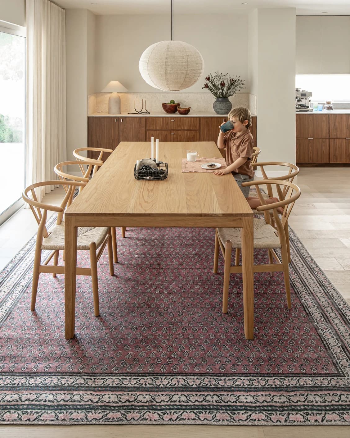 Vincent Coral carpet in coral, red and multicolour, shown in a lifestyle front view as image 7