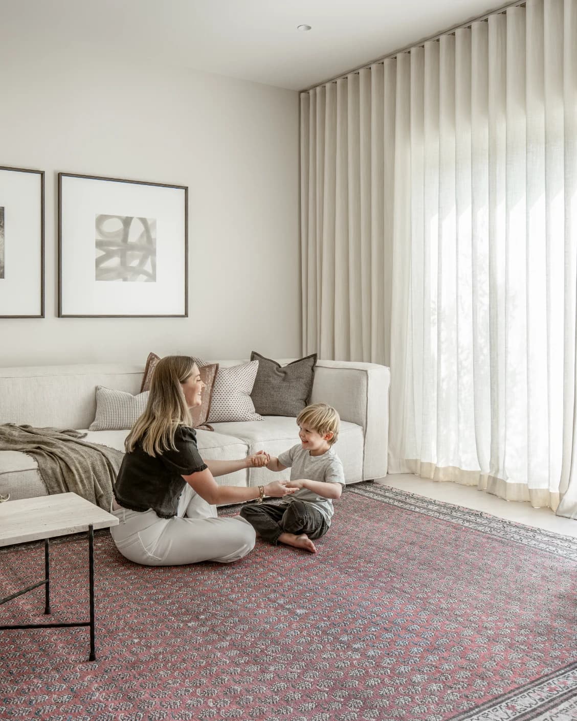 Vincent Coral carpet in coral, red and multicolour, shown in a lifestyle front view as image 10