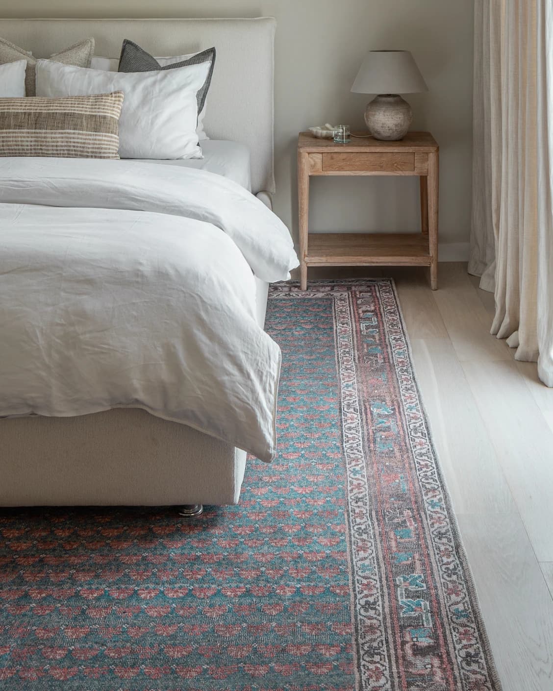 Vincent Denim carpet in blue, rust and multicolour, shown in a lifestyle front view as image 17