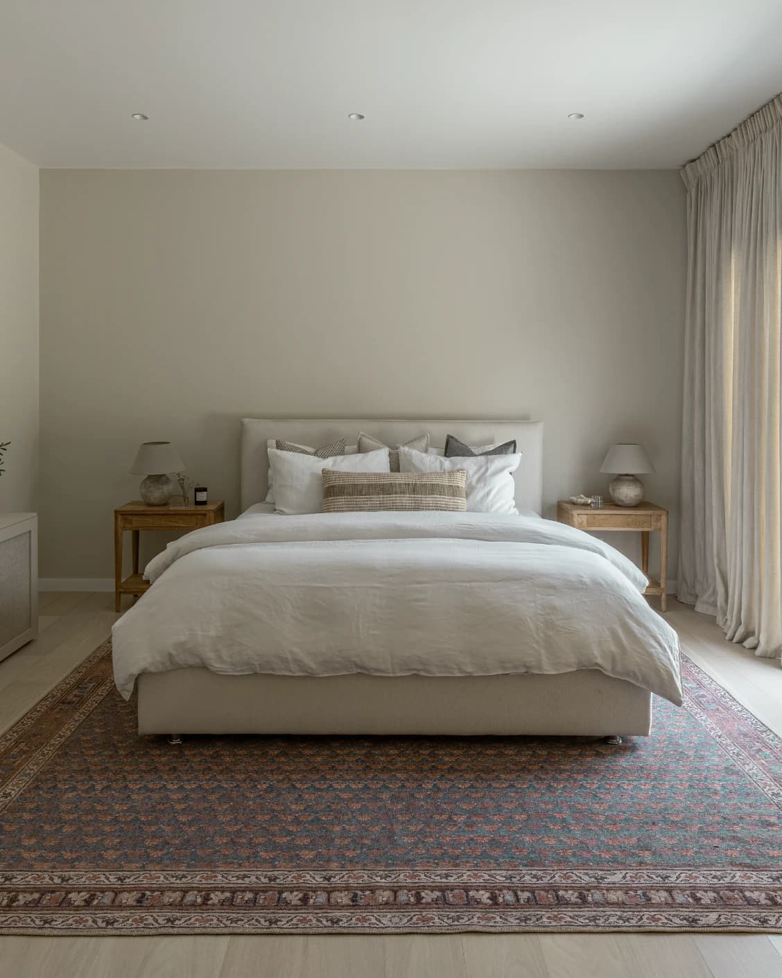 Vincent Denim carpet in blue, rust and multicolour, shown in a lifestyle front view as image 16