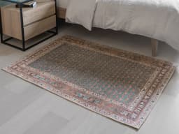 Vincent Denim carpet in blue, rust and multicolour, shown in a lifestyle front view