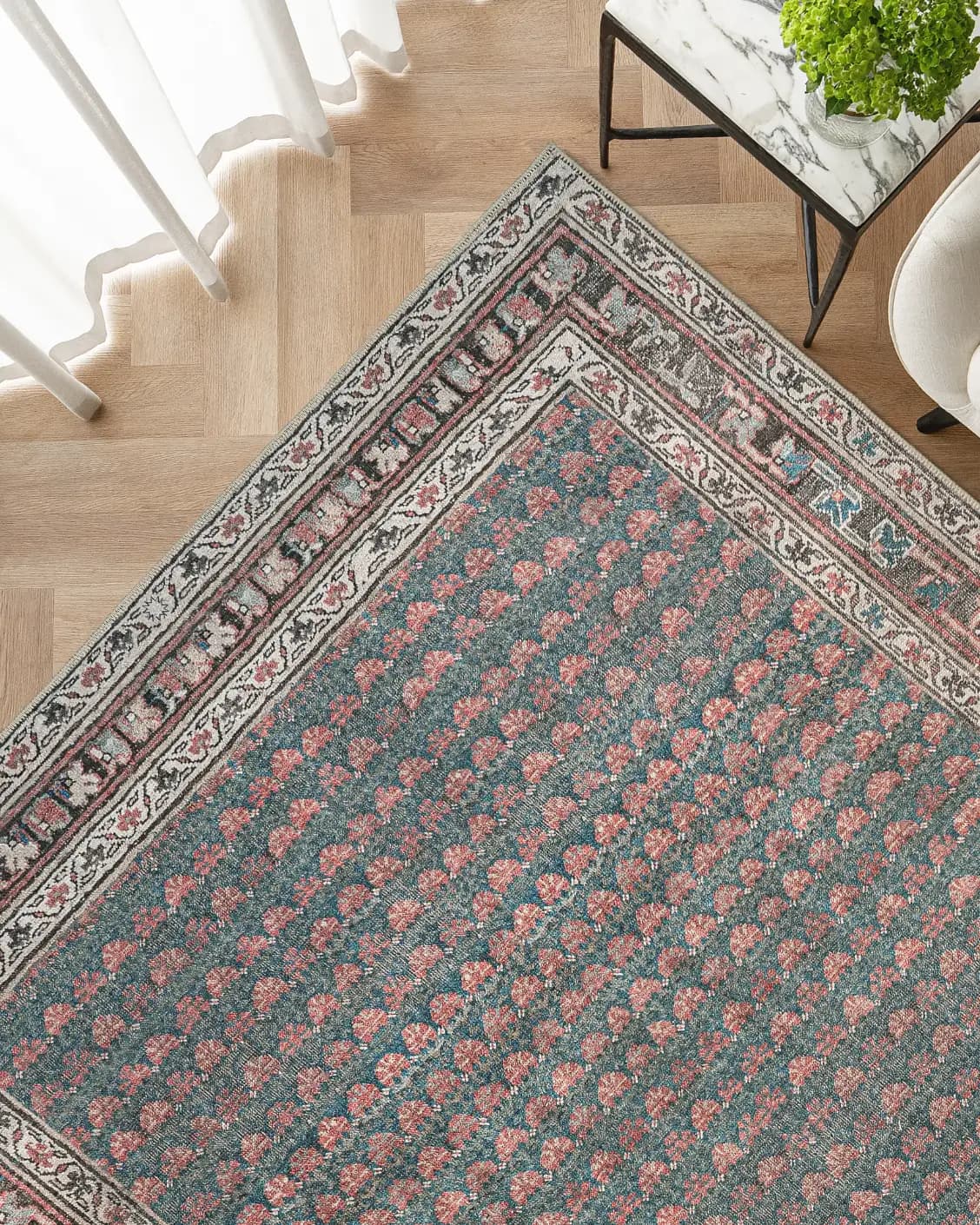 Vincent Denim carpet in blue, rust and multicolour, shown in a lifestyle top view as image 2