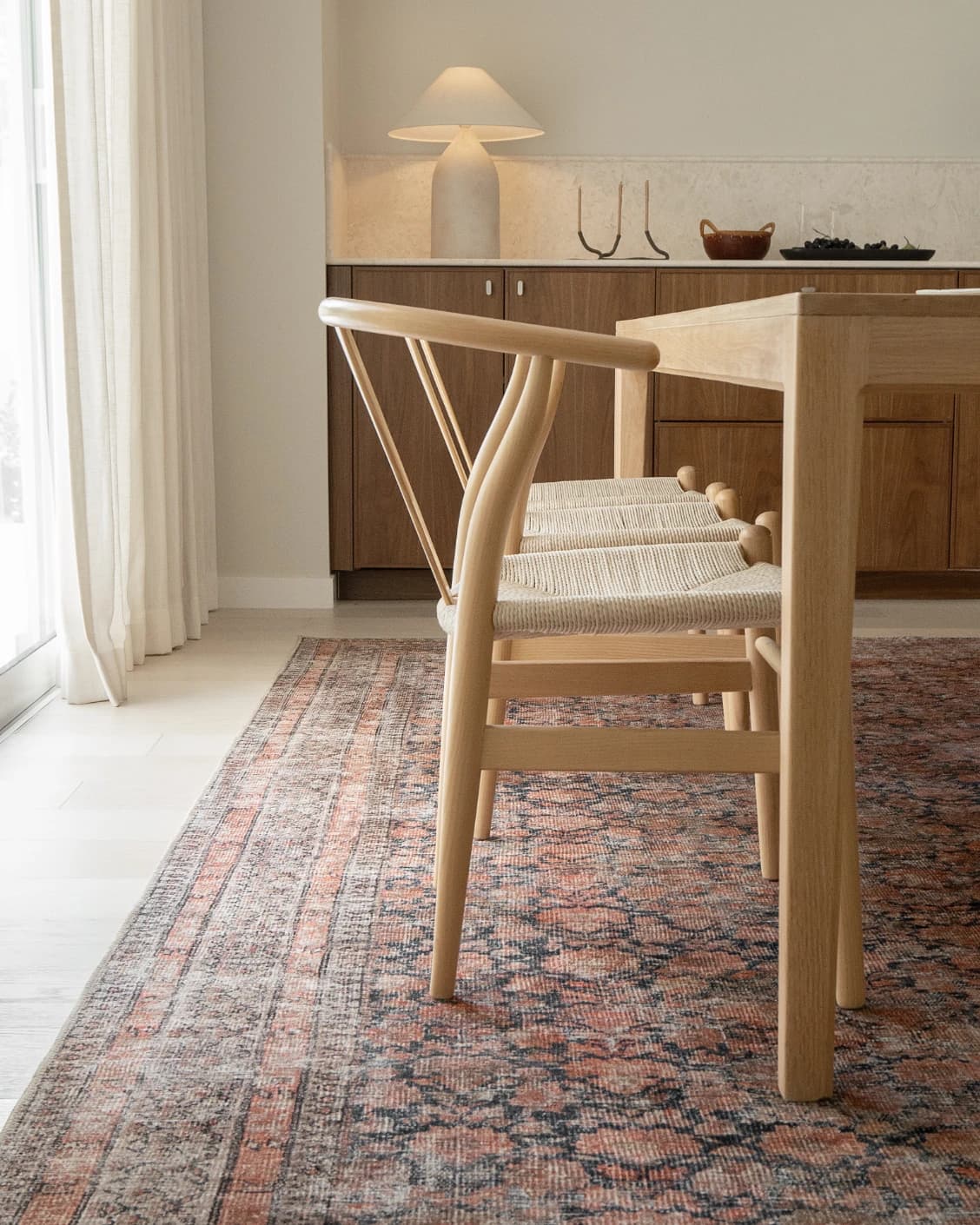 Vincent Terracotta carpet in rust and multicolour, shown in a lifestyle front view as image 7