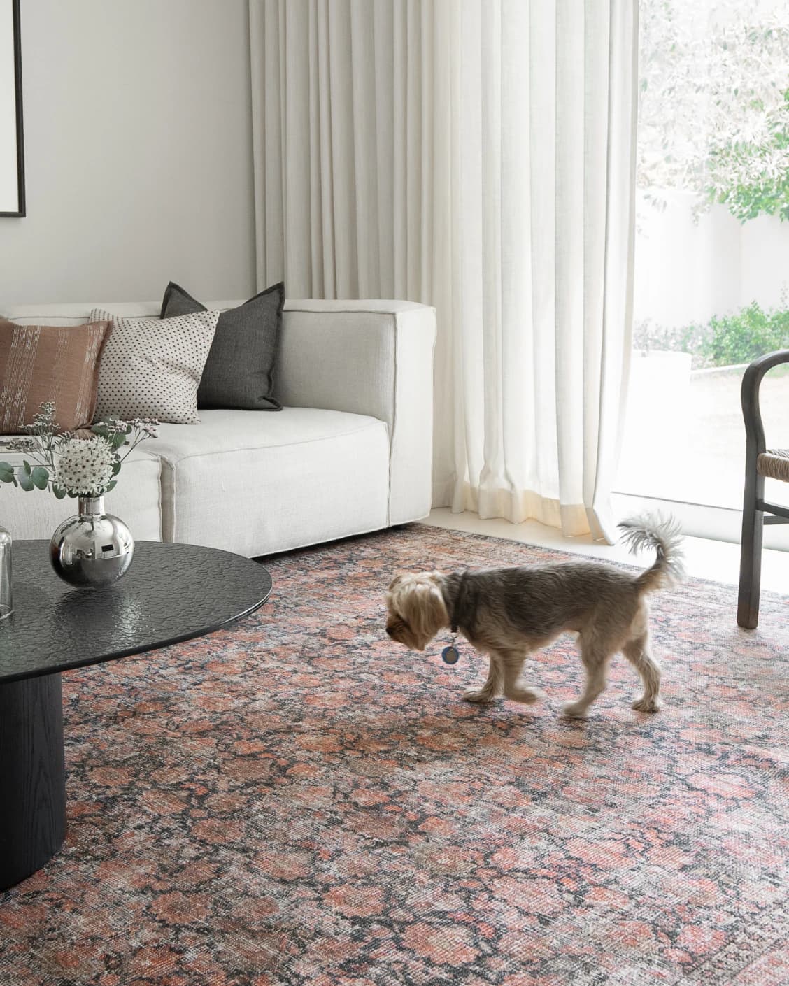Vincent Terracotta carpet in rust and multicolour, shown in a lifestyle front view as image 12
