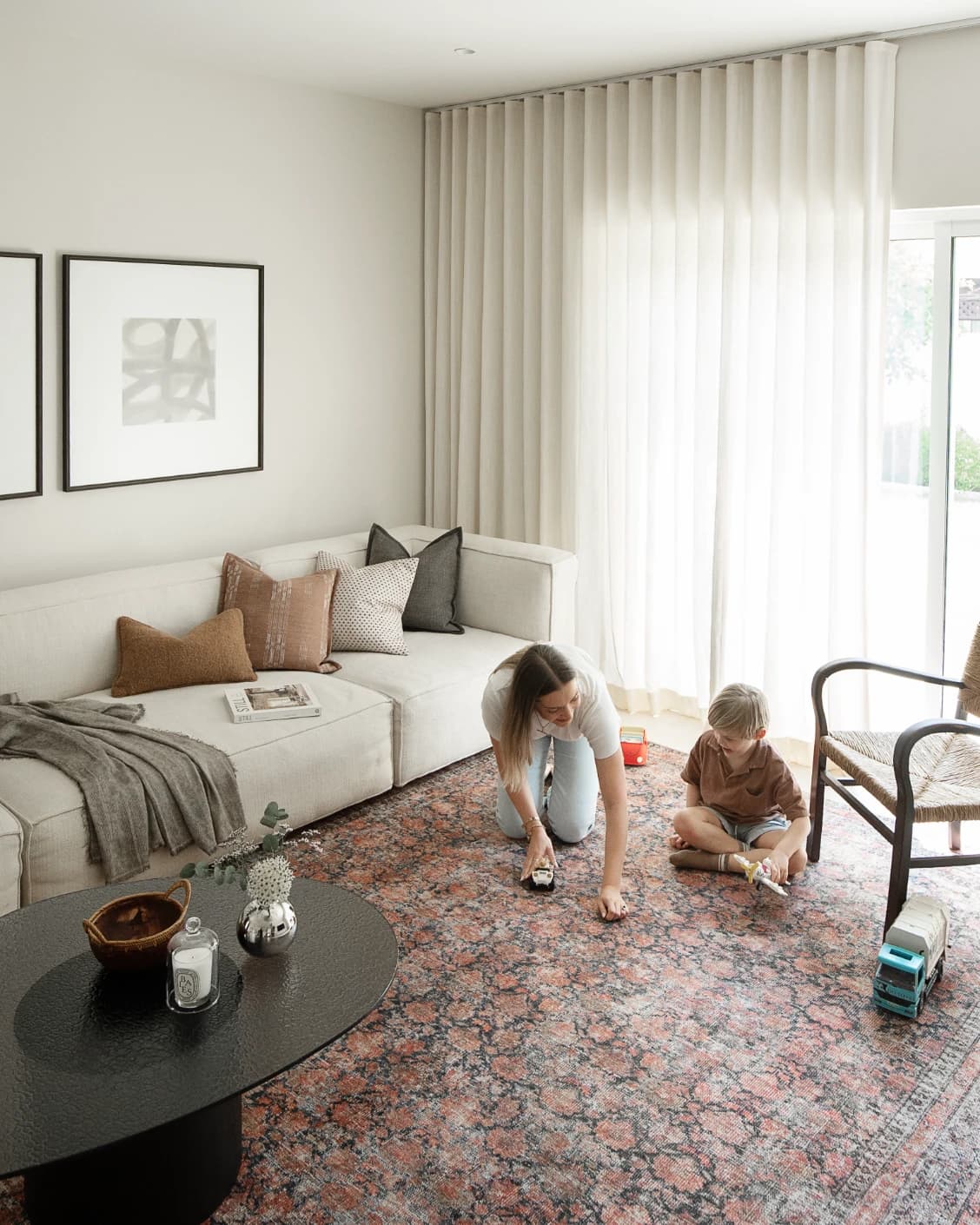 Vincent Terracotta carpet in rust and multicolour, shown in a lifestyle left view as image 24