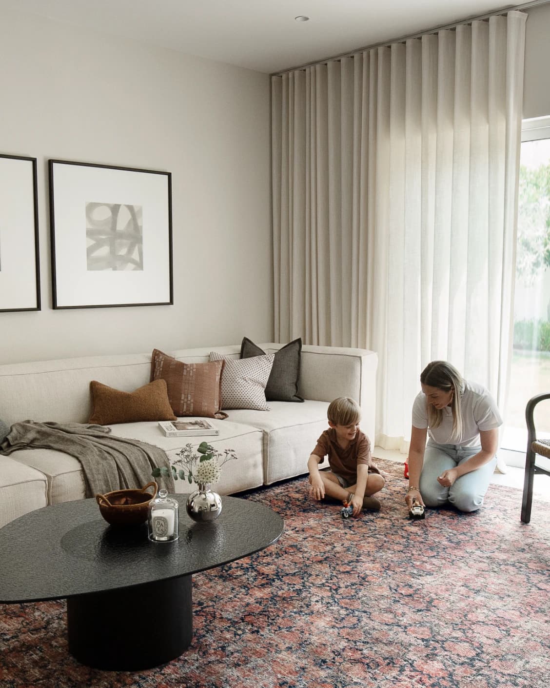 Vincent Terracotta carpet in rust and multicolour, shown in a lifestyle left view as image 23
